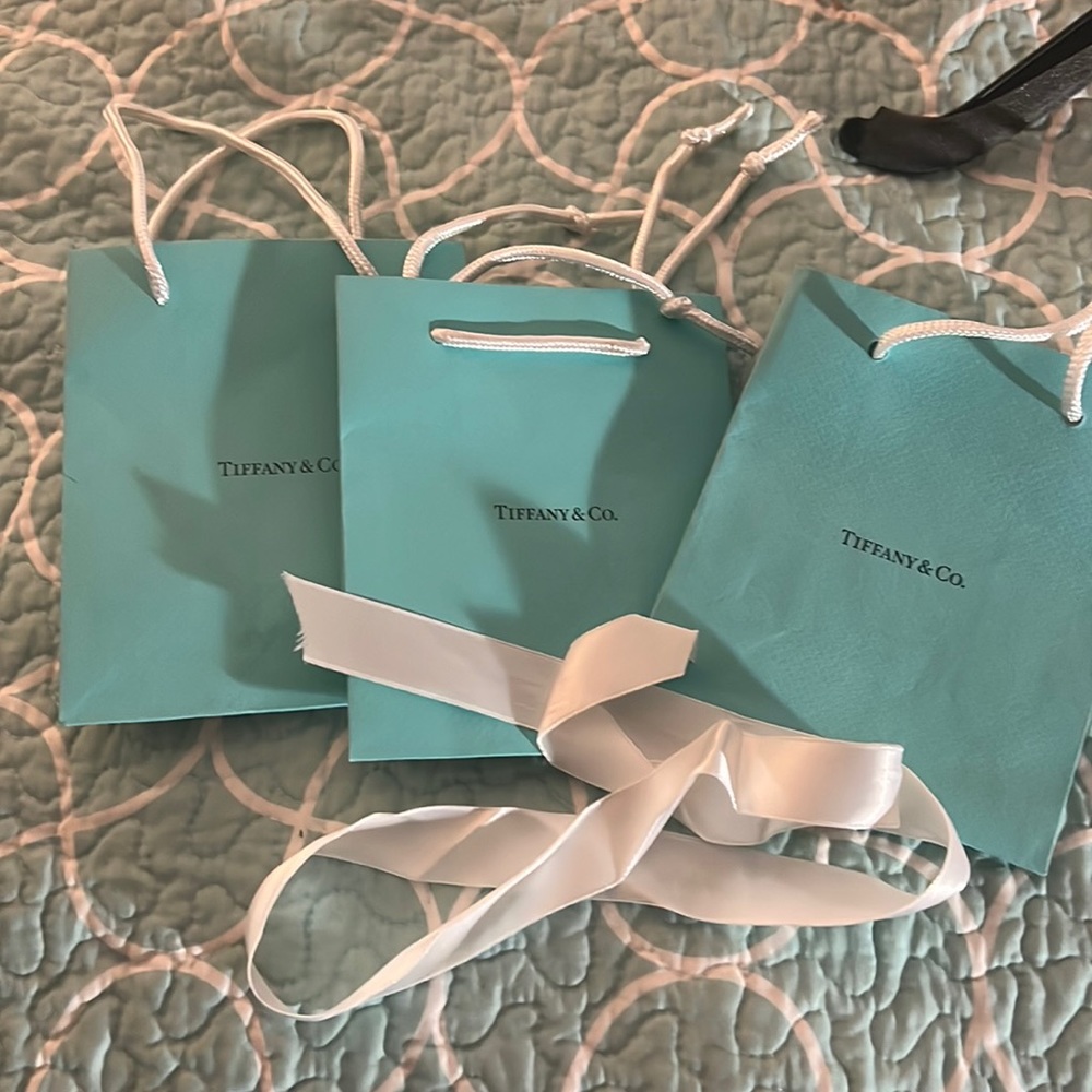 Three Tiffany and Co. bags